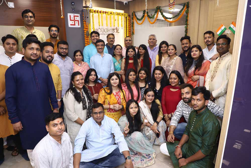 Group photo taken during Diwali puja in the office