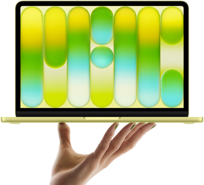 MacBook Neo in citrus color, balanced on fingertips of open hand, screen displaying colorful abstract pattern